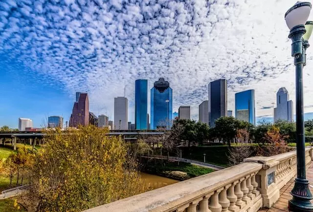 Houston city skyline under blue sky during daytime